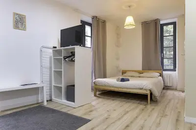 Un ou plusieurs lits dans un hébergement de l'établissement Studio Cosy Hyper centre - Fibre - Netflix