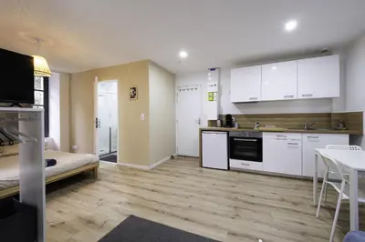 Cuisine ou kitchenette dans l'établissement Studio Cosy Hyper centre - Fibre - Netflix