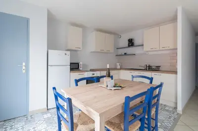 Cuisine ou kitchenette dans l'établissement Le Clémenceau - Centre-ville - Wifi