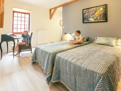 Un ou plusieurs lits dans un hébergement de l'établissement Château historique avec jardin, spa et salle de sport, idéal pour séminaires ou séjours détente - FR-1-426-516