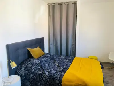 Un ou plusieurs lits dans un hébergement de l'établissement La villa Hérault