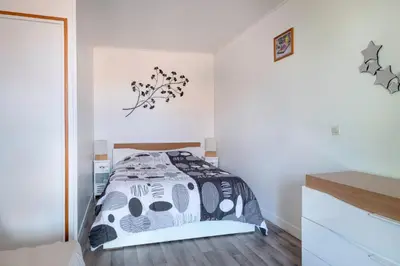 Un ou plusieurs lits dans un hébergement de l'établissement Maison en plein cœur du centre historique de Pornic