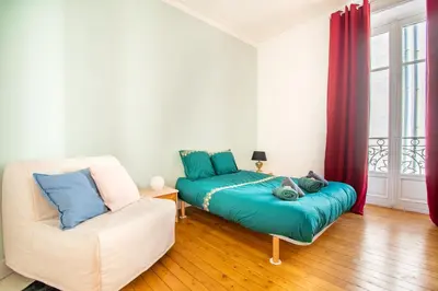 Un ou plusieurs lits dans un hébergement de l'établissement Superbe Appartement Calme 85m², à deux pas du Centre