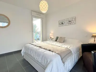 Un ou plusieurs lits dans un hébergement de l'établissement Appartement 2 pièces, 2 couchages, La Guérinière, balcon, parking - FR-1-224B-171