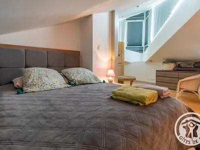 Un ou plusieurs lits dans un hébergement de l'établissement Gîte charmant avec jardin au cœur du vignoble du Layon, proche Saumur, 9 couchages, vélos inclus - FR-1-622-19