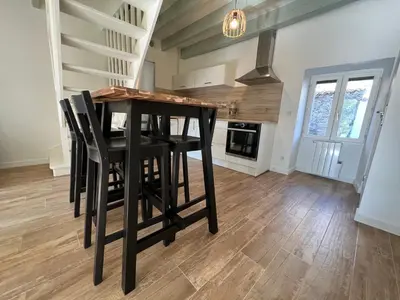 Cuisine ou kitchenette dans l'établissement Maison avec charme au calme