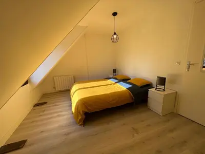 Un ou plusieurs lits dans un hébergement de l'établissement Maison avec charme au calme