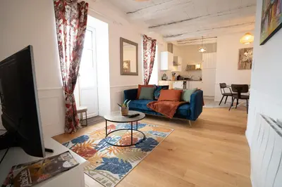 Télévision ou salle de divertissement dans l'établissement Appartement cosy en cœur de bourg