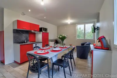 Cuisine ou kitchenette dans l'établissement Appart' hôtel Cholet