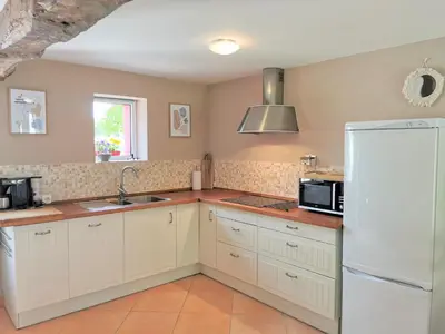 Cuisine ou kitchenette dans l'établissement Gîte à la campagne
