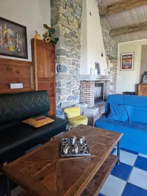 Coin salon dans l'établissement Maison de charme à Mouzillon - Jardin et terrasse accueillante