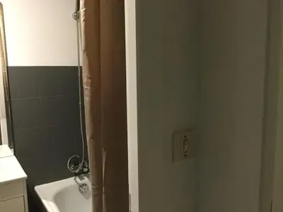 Salle de bains dans l'établissement T1 parc paysager St Nazaire
