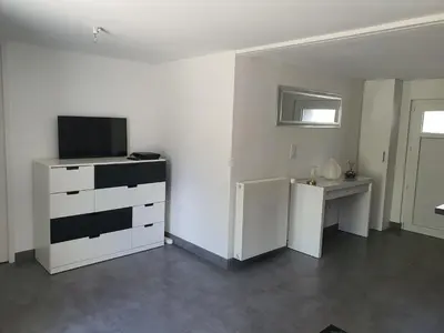 Télévision ou salle de divertissement dans l'établissement La Maison du Main Coon