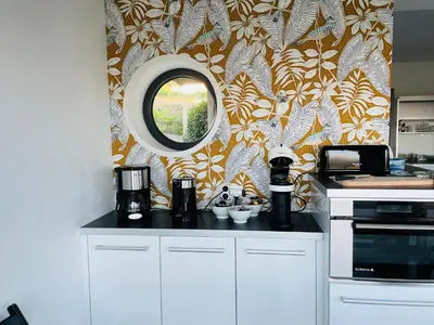 Cuisine ou kitchenette dans l'établissement Maison des Coteaux blancs
