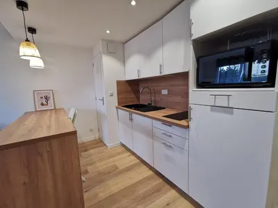 Cuisine ou kitchenette dans l'établissement Appartement proche plages