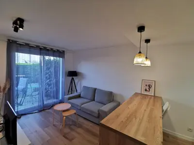 Coin salon dans l'établissement Appartement proche plages