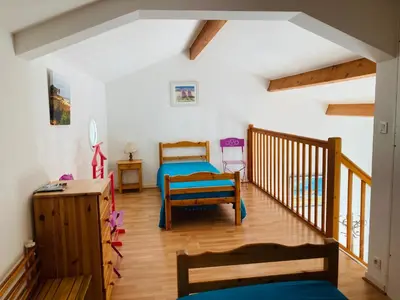 Un ou plusieurs lits dans un hébergement de l'établissement Maison du lac, golf et océan à 100m