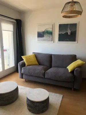 Coin salon dans l'établissement DEMOISELLES - Appartement 1 chambre