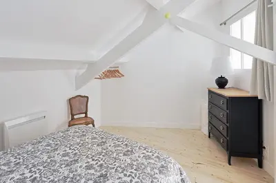 Un ou plusieurs lits dans un hébergement de l'établissement La Galerie Pornic - Maison Cedre