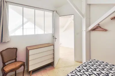 Un ou plusieurs lits dans un hébergement de l'établissement La Galerie Pornic - Maison Cedre