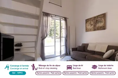 Coin salon dans l'établissement À 800m de la plage, maison pour 6 avec piscine