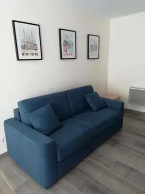 Coin salon dans l'établissement Studio Place 28 à Joue sur Erdre