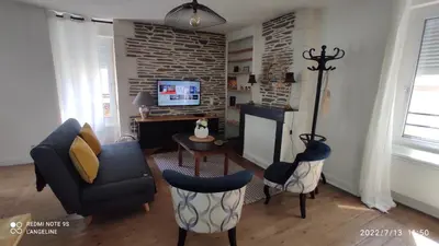 Télévision ou salle de divertissement dans l'établissement Le GENISTA