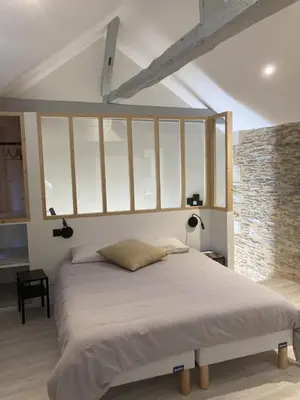 Un ou plusieurs lits dans un hébergement de l'établissement La Maison du Cocher - Chambre indépendante climatisée en Hypercentre - Lit Queen Size