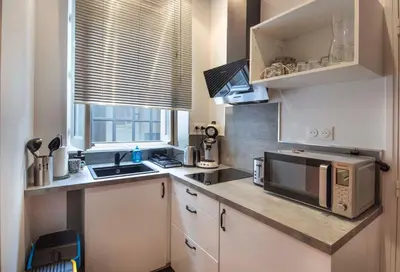 Cuisine ou kitchenette dans l'établissement La Grue Jaune