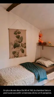 Un ou plusieurs lits dans un hébergement de l'établissement Cocon cosy et déconnecté 30min Puy du Fou - 2 chambres et 1 canapé lit