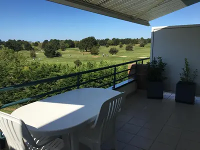 Balcon ou terrasse dans l'établissement La Terrasse du golf