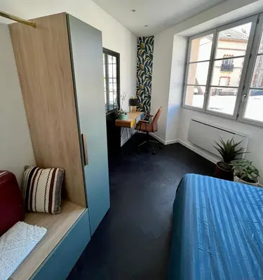 Un ou plusieurs lits dans un hébergement de l'établissement Superbe appartement - Cholet Centre
