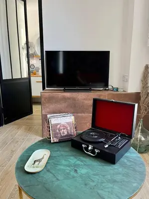 Télévision ou salle de divertissement dans l'établissement Appartement de charme - Cholet Centre