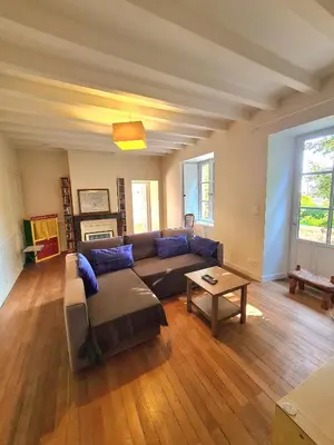 Coin salon dans l'établissement Les Hauts de St Jacques maison d'exception 300m2, jardin arboré 2000m2