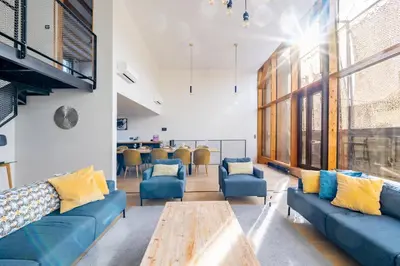Coin salon dans l'établissement Unique à Nantes ! Loft moderne avec rooftop 10pers