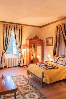 Un ou plusieurs lits dans un hébergement de l'établissement Chateau du Hallay