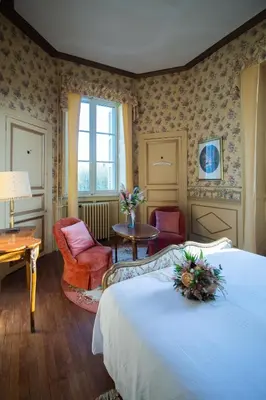 Un ou plusieurs lits dans un hébergement de l'établissement Chateau du Hallay