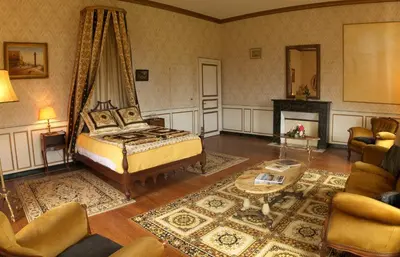 Un ou plusieurs lits dans un hébergement de l'établissement Chateau du Hallay
