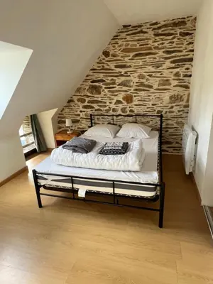 Un ou plusieurs lits dans un hébergement de l'établissement Gîte en Bretagne Sud Ty Nikolaz