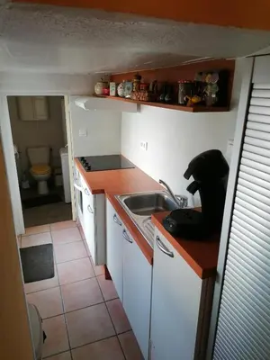 Cuisine ou kitchenette dans l'établissement Le 8