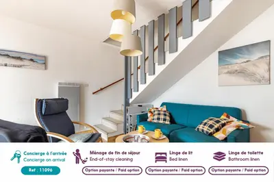 Coin salon dans l'établissement À 50m de la plage, charmante maison à St Hilaire