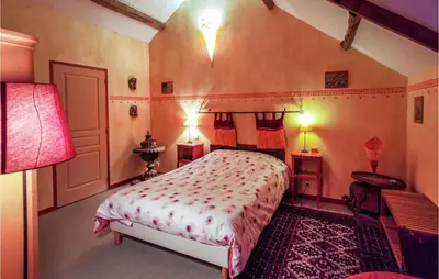 Un ou plusieurs lits dans un hébergement de l'établissement Pet Friendly Home In Marsac Sur Don