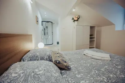 Un ou plusieurs lits dans un hébergement de l'établissement Appartement de charme, Angers Belle-Beille