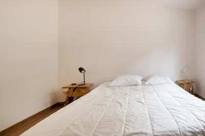 Un ou plusieurs lits dans un hébergement de l'établissement Belle maison proche de la mer pour 6 personnes