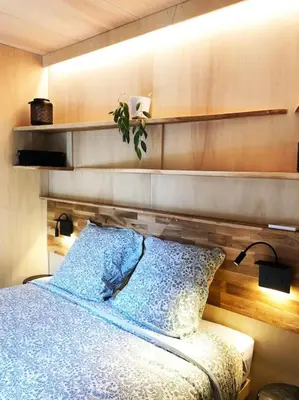 Un ou plusieurs lits dans un hébergement de l'établissement Vaimiti, cabane cosy sous les pins (50m de la plage)
