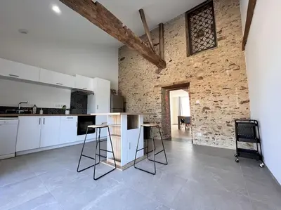Cuisine ou kitchenette dans l'établissement Gîte Les petits pirons