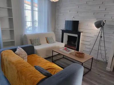 Coin salon dans l'établissement Charmante maison de Ville , 4 personnes , LES HERBIERS