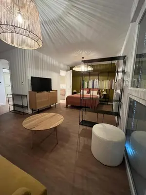 Télévision ou salle de divertissement dans l'établissement RESIDENCE MONTANA