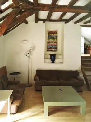 Coin salon dans l'établissement Bel appartement à la Chetardière