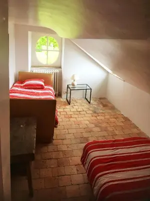 Un ou plusieurs lits dans un hébergement de l'établissement Bel appartement à la Chetardière